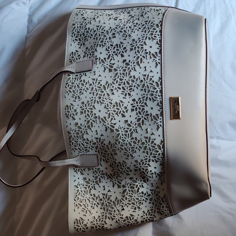 White/Beige laser cut Kate spade tote with writstlet